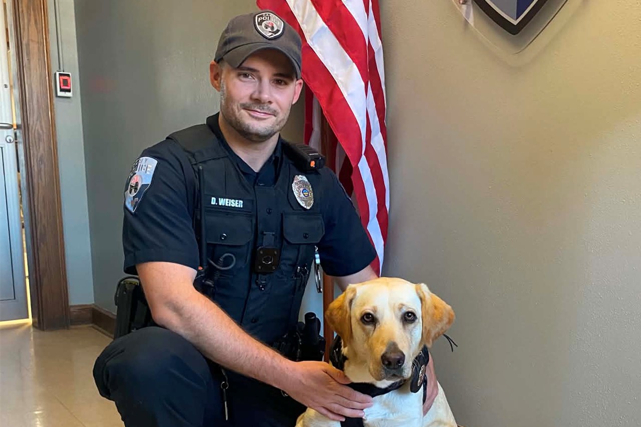 Officer Weiser poses with K9 Amboo.