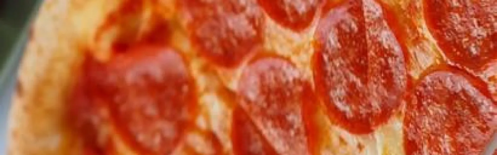 Closeup of a delicious pepperoni pizza.